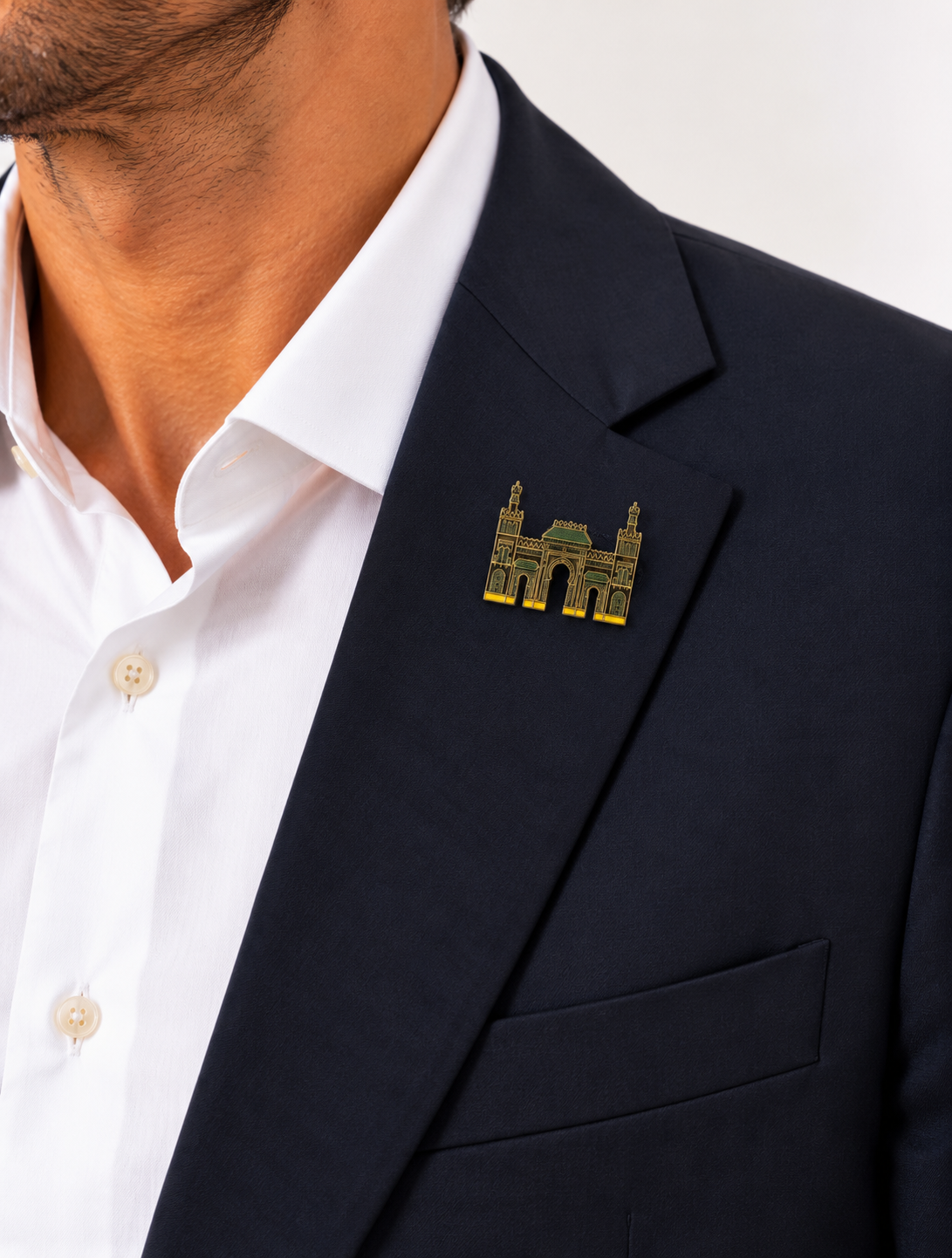 PIN PORTADA 2027 DORADO
